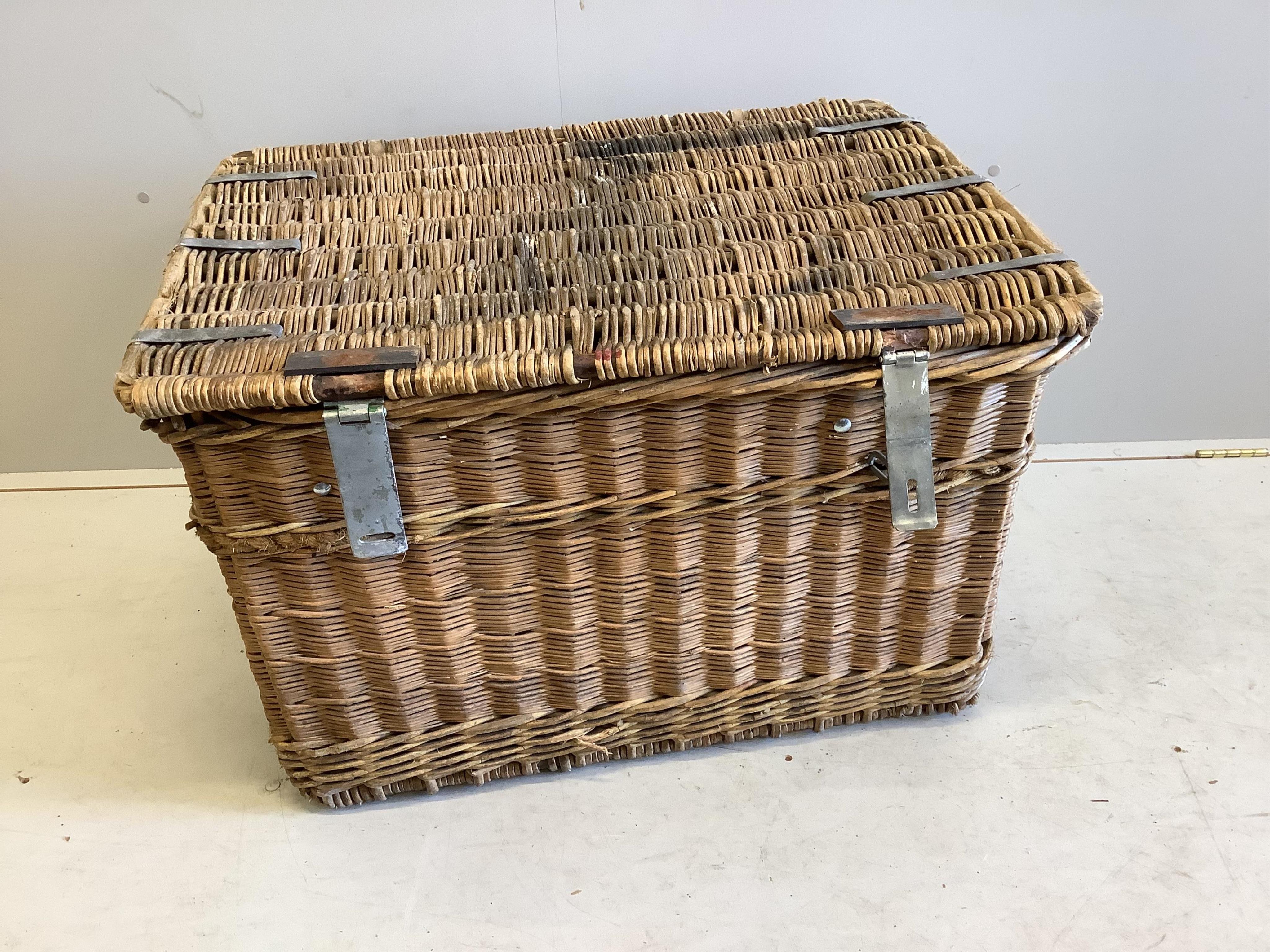 A vintage wicker laundry basket, width 86cm, depth 61cm, height 53cm